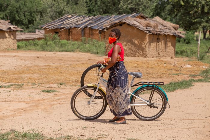 lady-in-the-village-on-a-bicycle